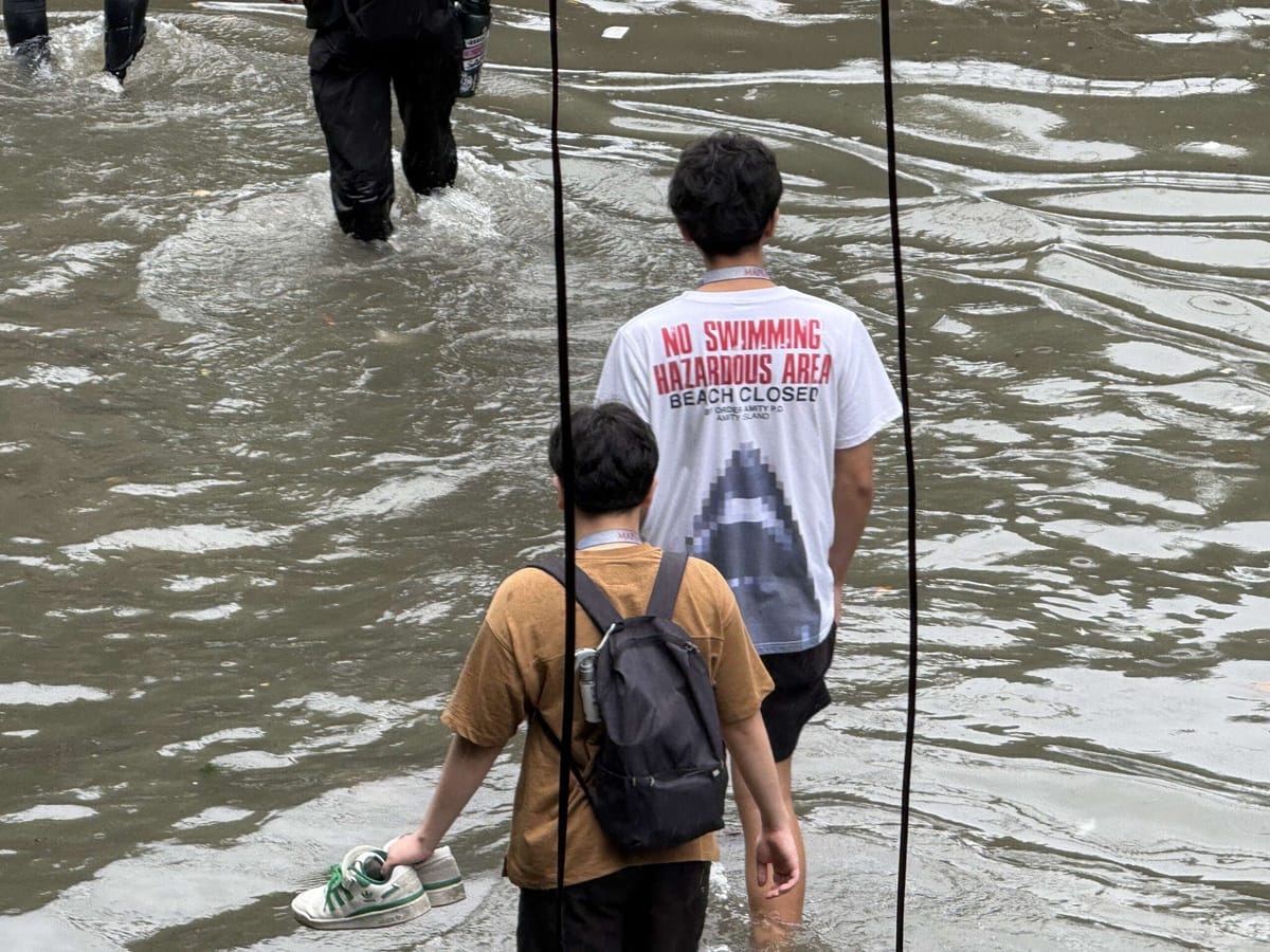 Rains, high tide leave persistent floods across Manila